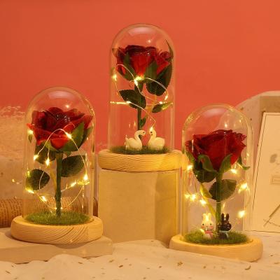 China Best Gift For Loved One Bunny Single Swan Artificial Flower LED Tiny Light Touch Real Silk Red Rose In Glass Dome For Valentine Proposal Wedding Gift for sale