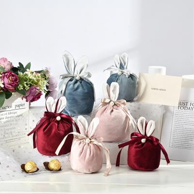 China Easter Party Favor Egg Bag Whoelsae Easter Party Decoration Supplies New Design Bunny Ears Drawstring Velvet Sweet Candy Chocolate Bag for sale