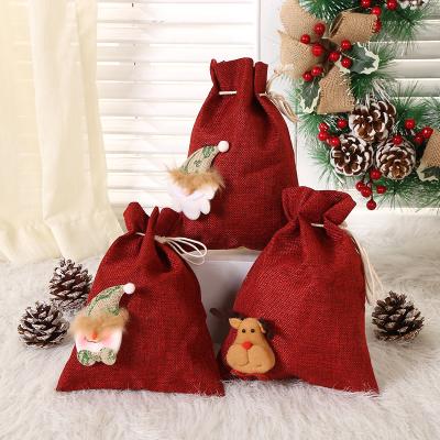 China Red Christmas Tree Decoration Gift Candy Bag Drawstring Candy Gift Bag for Christmas Tree Decoration Elk Reindeer Snowman Santa Christmas for Christmas Tree Decoration Gift Candy Bag children for sale