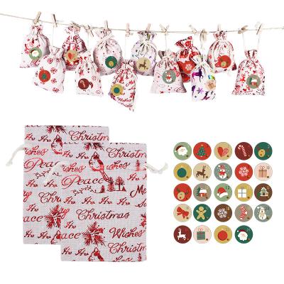 China Christmas Tree Decoration Gift Candy Bag Customize Personalized Gilding Printing Christmas Gift Bag For Christmas Tree Hanging Decorative Bag Drawstring Clip Sticker Set for sale