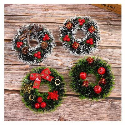 China Artificial Green Christmas Party Decoration Tree Ball Ribbon Wreath Garland Door Decoration Props for sale