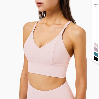 China Breathable Sexy Women Sport To Wear Cross Back High Intensity Slim Crop Top Sports V-Neck Straps Workout Top Original Design for sale