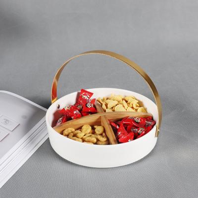 China Morden Luxury New Arrivals White Porcelain Snacks Serving Dish Basket With Golden Metal Handle for sale