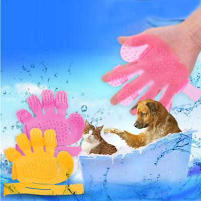 China Viable With Back Tie Soft Animal Gloves 2-In-1 Cat Dog Pet Massage Belt Brushes Comb Function PVC Grooming Gloves for sale