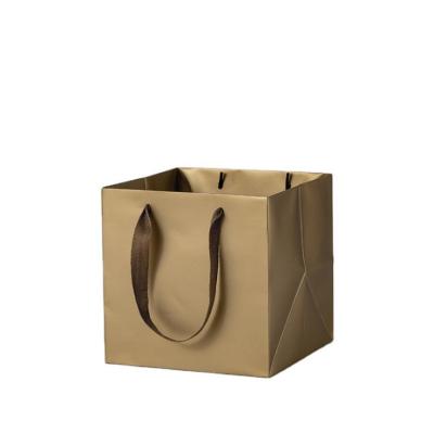 China Custom Recyclable Logo Cake Flower Brown Shopping Kraft Paper Square Gift Bottom Paper Bags With Ribbon Handles for sale