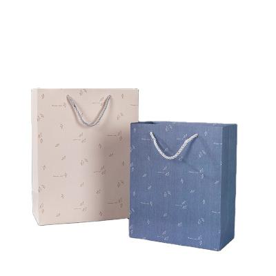 China Recyclable Wholesale High End Black Shoes Clothes Packaging Paper Bags Clothing Gift Shopping Bags for sale