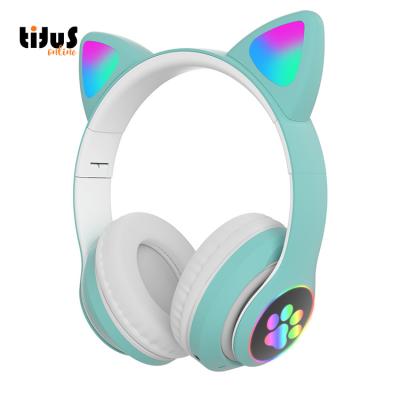 China AKS28 In-ear macaron cat ear earphone kids fm tf card kids headphones cat shaped led color changing wireless BT earphone for sale