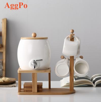 China Large Capacity Sustainable Ceramic Pitcher, Ceramic Kettle Hot/Cold Water Jug Cup Set With Wooden Stand For Juice And Iced Tea for sale