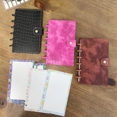 China RINGNOTE A6 PU Disc Grab Notebook Leather Planner Inside Pages With Flowers College Notebook for sale