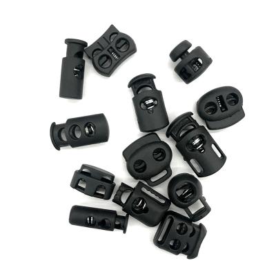 China New Cord Adjuster Lock Spring Smooth Toggle End Garment Plastic Stopper for sale