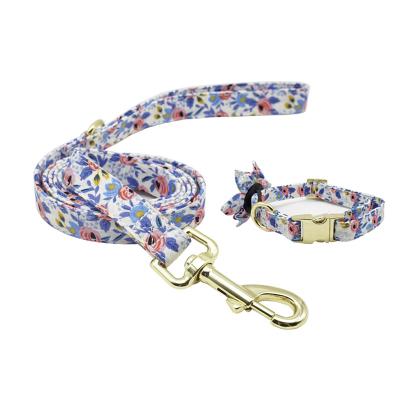 China Custom Custom Laser Logo Cotton Strap Floral Design Dog Collar and Leash Set with Gold Buckle for sale