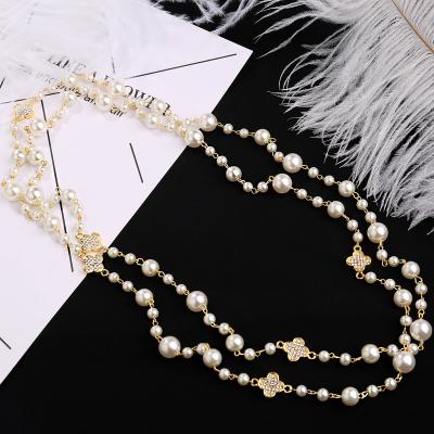 China CLASSIC Famous Brand Inspired Leaf Metal Necklace Designer Long Pearl Necklace Pendant Jewelry for sale