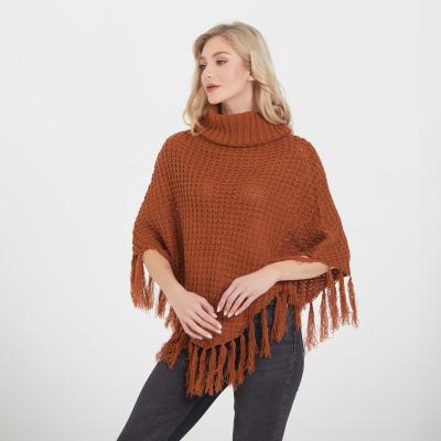 China Anti-Wrinkle OEM/ODM Accept Designer Ladies Turtle Neck Off Shoulder Oversized Fancy Knitted Tassels Poncho Women Sweater for sale