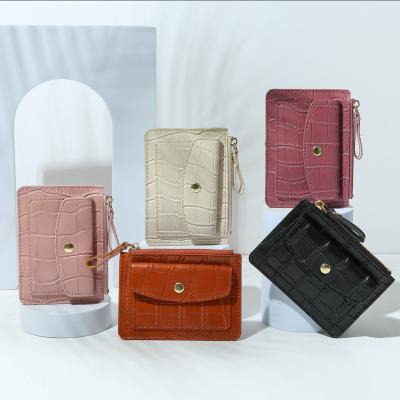 China Small Cool Wholesale New Card Zipper Bag CSI Candy Color Sorting Box Crocodile Pattern Waterproof Female Coin Purse Set Logo Wallet for sale