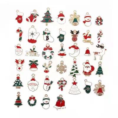 China Christmas Tiktok Decoration Wholesale 38 Styles Christmas Tree Stocking Alloy Snowman Christmas Theme Decoration DIY Pendants Cute Jewelry for sale