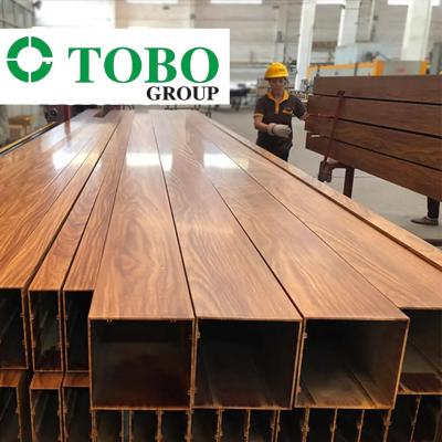 Cina Aksu Wooden Grain Aluminum Profile Alloy Construction Rectangular Tubes / Aluminum Square Pipes 6063 6061 6082 New mater in vendita