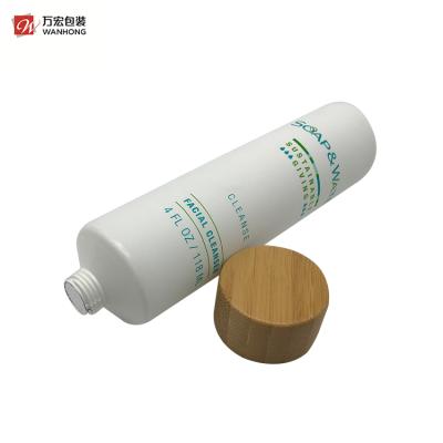 China Eco - Friendly Cosmetic Packaging Face Wash Packaging Tube With Screw Bamboo Cap Cosmetic Packaging for sale