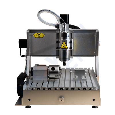 China MDF dowin cnc router 4 WOOD ACRYLIC ALUMINUM axies 5 axies wood fast doors engraving plates cutting 3040 6090 800w 1.5kw 2.2kw machine cnc for sale