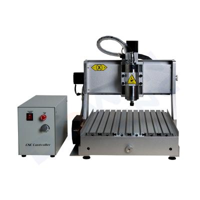 China Fast mini dw 6040 WOOD ACRYLIC MDF ALUMINUM ACRYLIC 3d Router CNC router mach 3 software control 400*600 bed size 30mm bed size 30mm wood engraver for sale