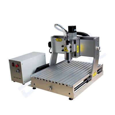 China MDF 300*200mm ALUMINUM ACRYLIC WOODEN 6090 800w 1.5kw 2.2kw Engraving Machine Gold Cutting Aluminum Silver Engraver for sale