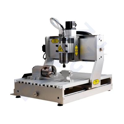 China MDF ACRYLIC ALUMINUM WOODEN machine CNC 3d 3040 6090 800w 1.5kw 2.2kw internal laser engraving machine for crystal silver engraver for sale