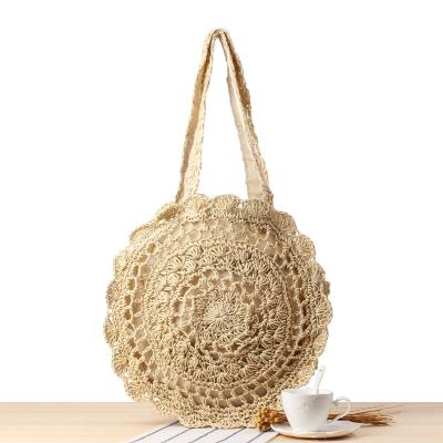 China Handmade Flower Straw Beach Bag Raffia Round Straw Bag Fashion Eco-friendly Summer Tote Bag for sale