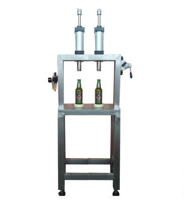 China Small Two Heads Manual Beverage Glass Bottle Beer Filling Capping Machine for sale