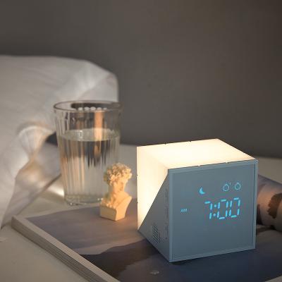 China Cartoon Sunset Fashion Hot Selling Bedside Lamp Wake Up Sunrise Light Simulation Led Screen Voice Control Alarm Clock for sale