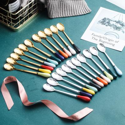 China Sustainable Gifts Colorful Stainless Steel Coffee Mixing Tasting Spoon Dessert Spoon With Ceramic Handle for sale