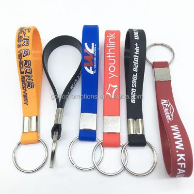 China High Quality Volume Printed Cheap Custom Design Your Own Silicone Rubber Wristband Key Holder Wristband Silicone Key Chain for sale