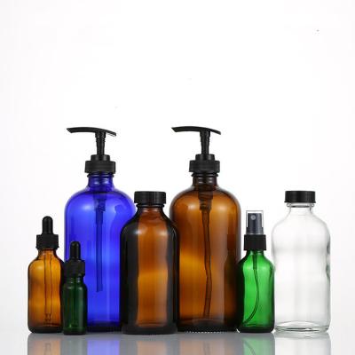 China Personal Care Flint Boston Round Glass Bottle for sale