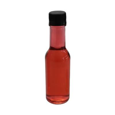 China Multi Food Size Food Grade Glass Sauce Bottle With Plastic Lid , Hot Sauce Clear Bottles Glass With Screw Cap for sale