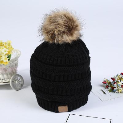 China COMMON high quality unisex winter logo warm winter hat custom fur knitted pom pom beanie for sale