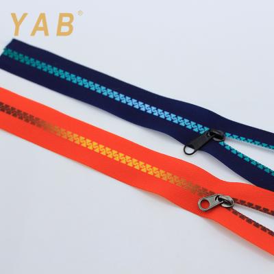 China YAB Wholesale Direct Double Color Separating Home Textile Reversible Nylon Zipper Roll For Home Textile And Garment for sale