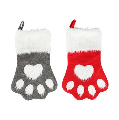 China Custom Environmental Materials Sublimation Christmas Felt Christmas Socks Ornaments Christmas Stocking Dog Paw Applique Gift Bag Home Decor Party Supplies 2021 for sale