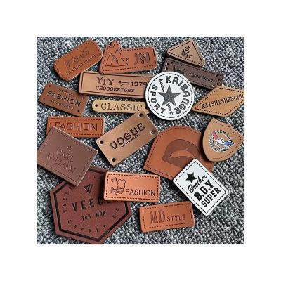 China Handmade Product High Quality PU Sew On Leather Labels Leather Labels Custom Leather Embossed Label for sale