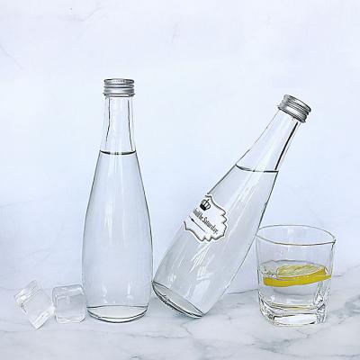 China Glass Kombucha Beverage Bottle Crystal Glass Juice Bottle With Aluminum Lid for sale