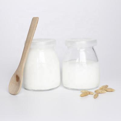 China Wholesale Heatable 100ml 200ml Glass Pudding Container Yogurt Jars With Plastic Lids for sale