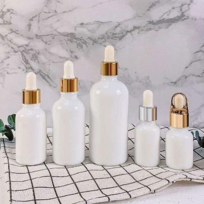 China Oi Essential 10ml Luxury 30ml 50ml Empty 100ml Essential Oil Opal White Porcelain Glossy Glass Dropper Bottle With Euro White Dropper for sale