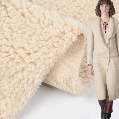 China Professional custom made anti pill beautiful polyester fiber weft knitted brushed terry borg fabric for winter coat for sale