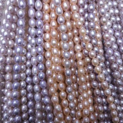 China Jewelry Making Cultured White Pink Purple Beads 7mm Rice Shape Freshwater Pearls Strand Loose Beads For Jewelry Making for sale