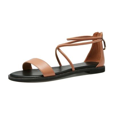 China Fashion Trend Personality Fashion Summer Cross Strap Flat Sandals For Women And Ladies for sale