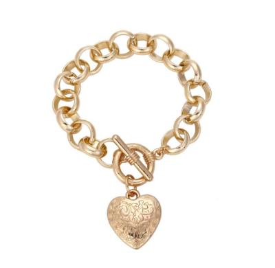 China Hiphop Charm Bracelet Heart Shaped Jewelry For New OT Lady Woman's Button Bracelet 2021 for sale