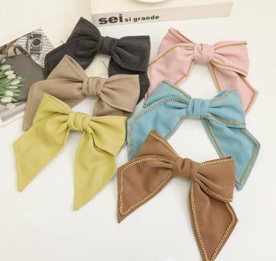 China Hair Decoration Hair Bows Big Cuts Stain Ribbon Hair Barrettes Bowknot Silk Hair Accessories For Women Girls Teens for sale