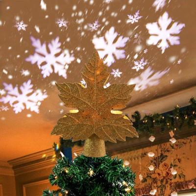 China Top Type Christmas Tree Projection Lamp Snow Storm LED Modern Explosive Tree Star Projection Lamp Leaf Top Light for sale