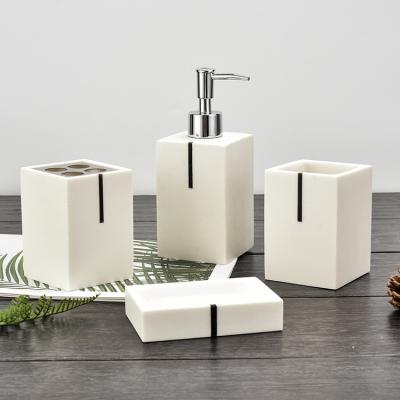 China Sustainable White Square Decorated With Black Bar Resin Bathroom Accessories Set for sale