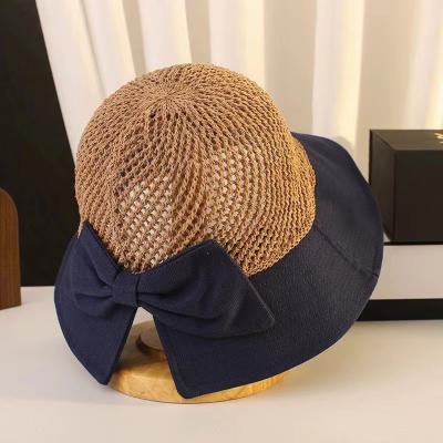 China Adjustable Dobby Fashion UV Wide Brim Sun Hat Knitting Breathable Summer Bow Fisherman Sun Hat for sale