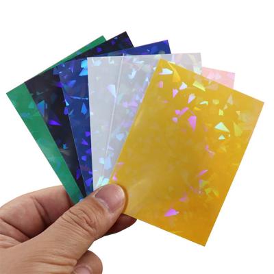 China Custom Clear Holographic Card Protective Sleeves 66x91mm Sports Card Plastic Sleeves for sale