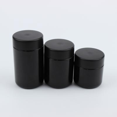 China Personal Care Popular Design 2oz 3oz 4oz Black Glass Jar With 44mm Black Plastic Child Resistant Cap for sale