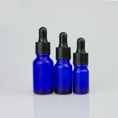 China Essential Oil Cosmetic Blue Empty Bottle With 18/415 Black Smooth Dropper Cap for sale